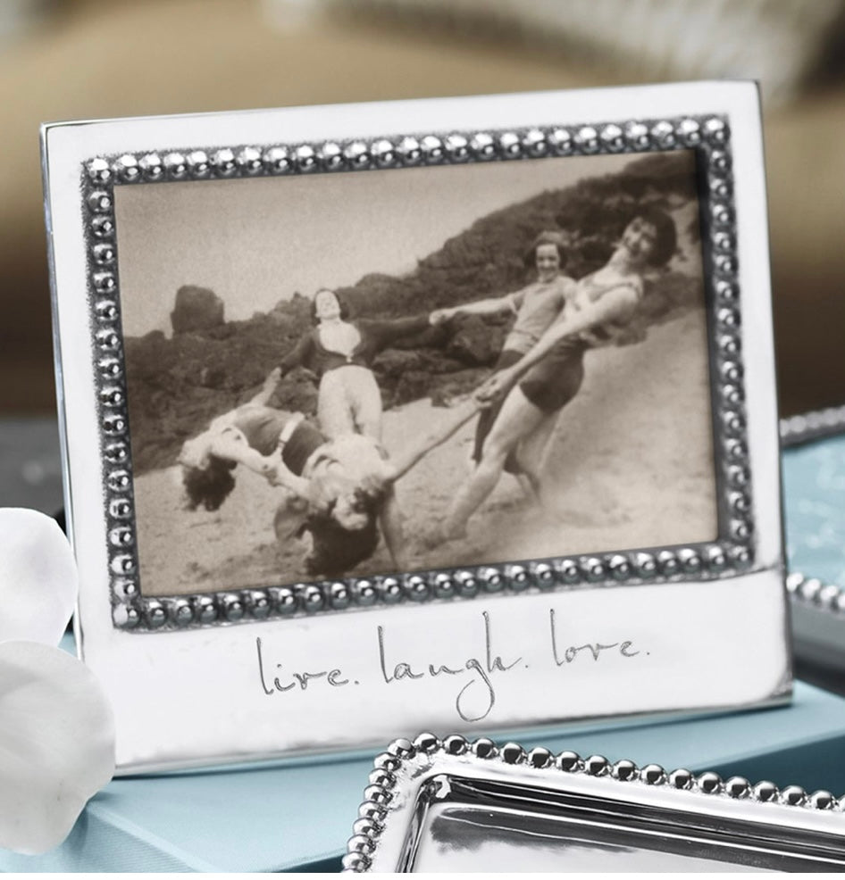 "LIVE LAUGH LOVE" frame