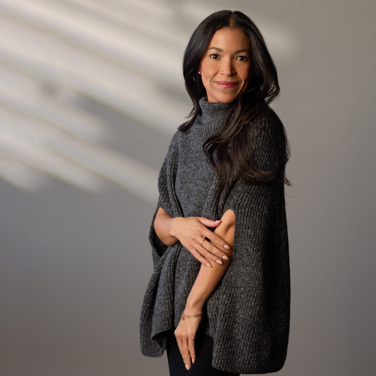 Demdaco Black Turtleneck Pullover Cape, Your Journey collection