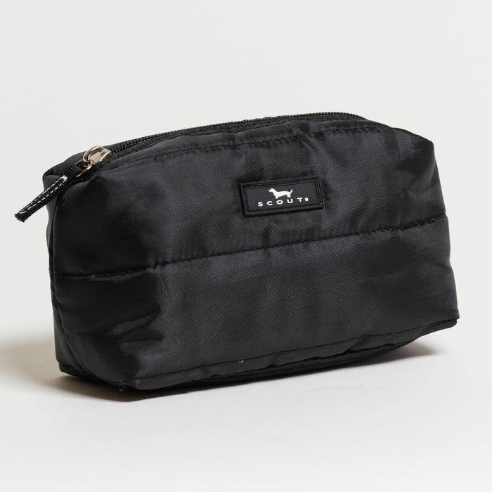SCOUT Tiny Treasures zip pouch shown in a compact size with a solid black durable fabric, styled as a small travel and cosmetic organizer for makeup and accessories