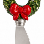 Christmas Wreath stainless steel cheese spreader with hand-painted stoneware holiday figural handle, 5.5 inches long.