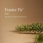 A clean product graphic for Frasier Fir Fresh, showing white text on a warm tan background with green pine branches across the lower right. The text reads 'Frasier Fir', 'Fresh', and 'Siberian Fir, Cedarwood, Sandalwood'.
