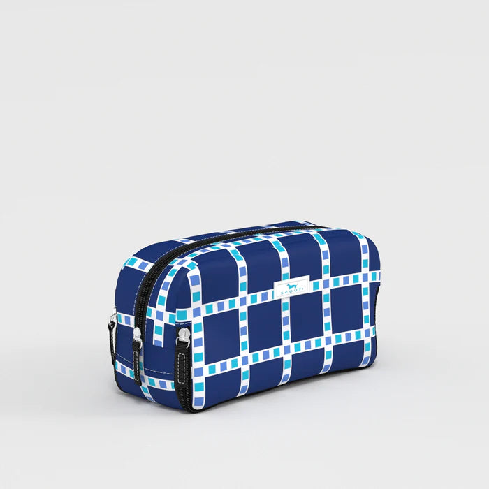 SCOUT 3-Way Toiletry Bag medium shown with three zip compartments in a structured rectangular design, styled as a travel toiletry and makeup organizer pouch