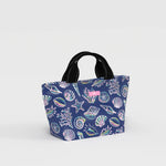 SCOUT Nooner Lunch Bag insulated lunch tote shown in a structured rectangular design with top handle and zip closure, styled as a compact everyday food carrier