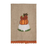 Decorative towel with pumpkins and lace trim on a beige background