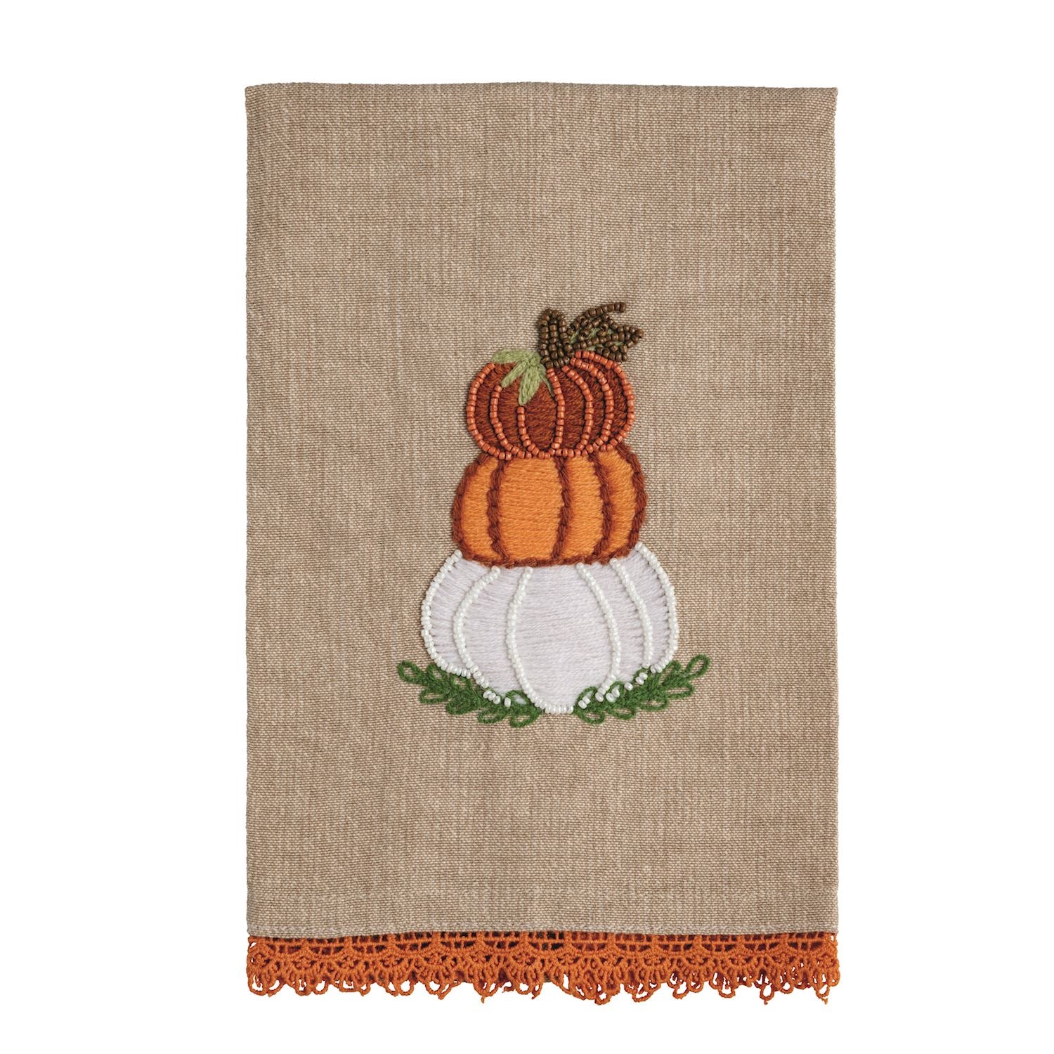 Decorative towel with pumpkins and lace trim on a beige background