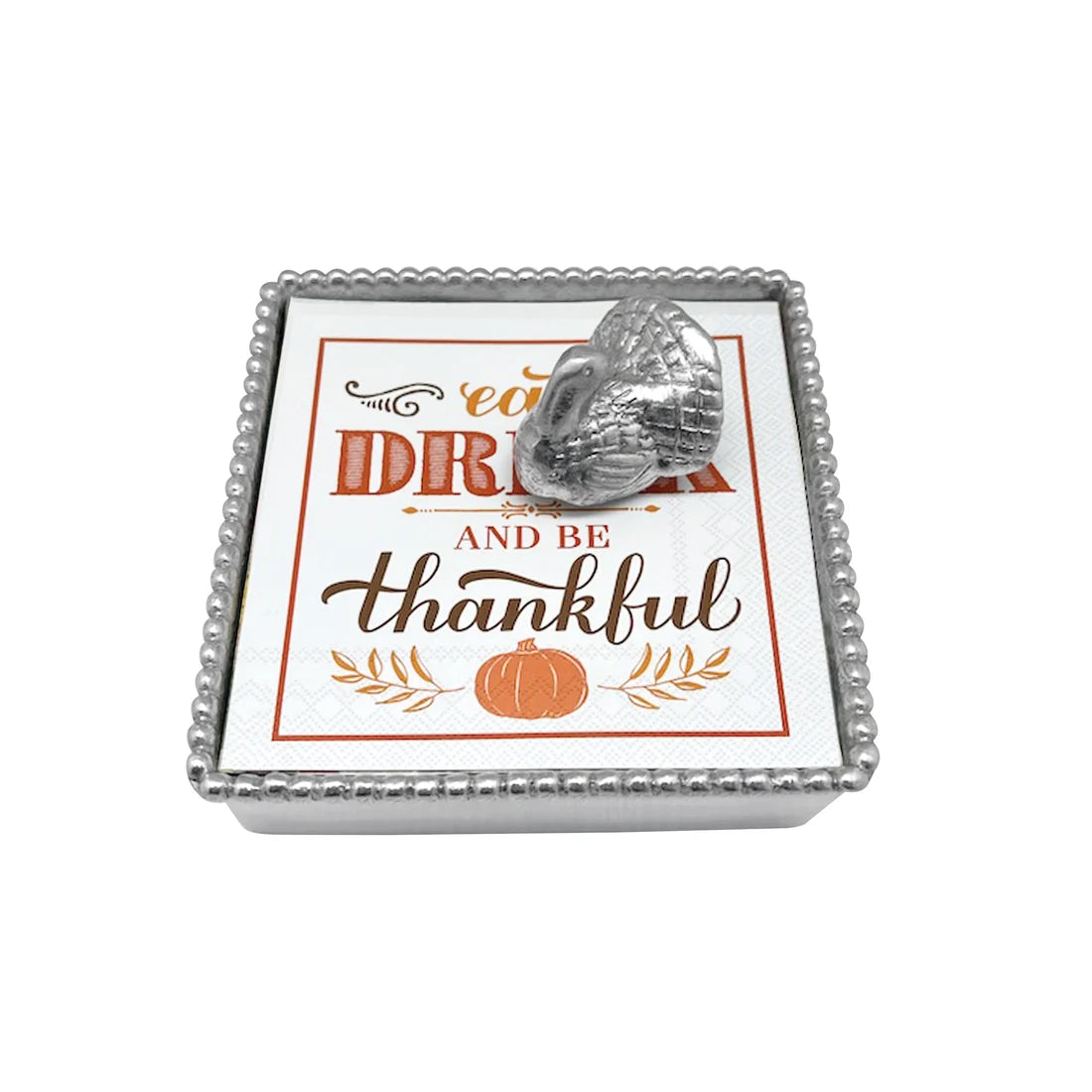 A square silver-toned decorative box with a beaded edge, shown from above on a white background. The lid features a printed autumn-themed design with the words 'enjoy your time, be grateful and be thankful,' along with orange text, a pumpkin illustration, and a small silver heart-shaped ornament resting on top.