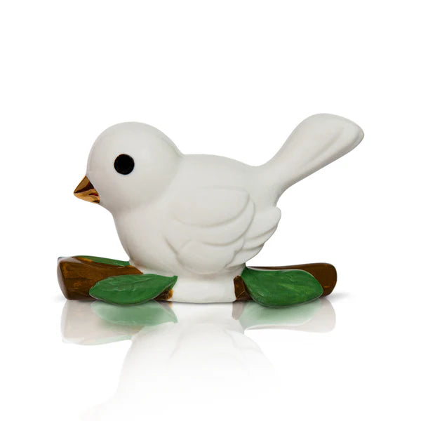 Nora Fleming mini holiday decoration on serving platter